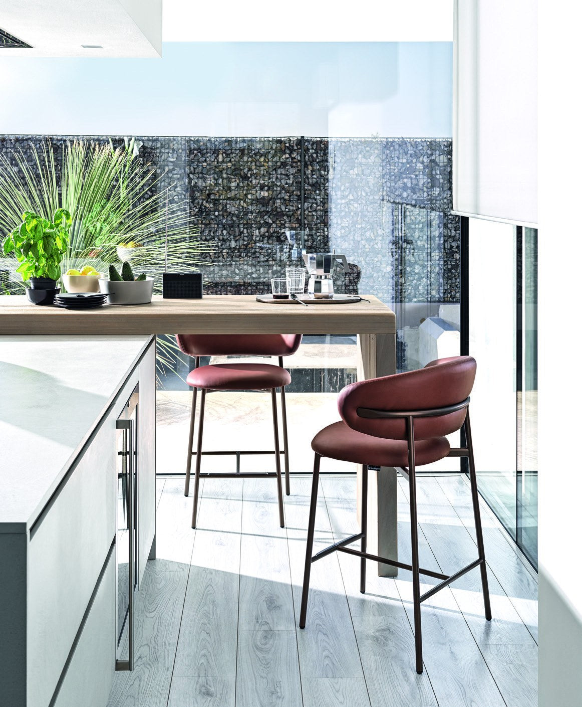 Oleandro Counter Stool - leather upholstery, metal frame at kitchen island